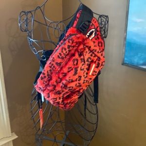 The spray phantom pack red and black leopard print with authentic patch